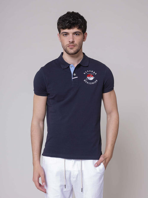 Polo ricamo worldwide|Colore:Blu